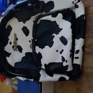 Cow print backpack purse